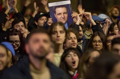 Pro-EU centrist wins Romania's tense presidential race