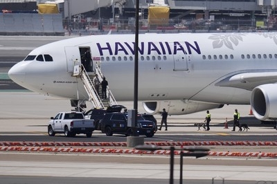 Flight at San Diego airport evacuated and 1 arrested following reports of a bomb threat