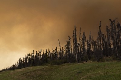 Wildfires burning across central Canada force more people to evacuate