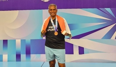 Dr. Manimara Chozhan shines at the World Masters Badminton Championship