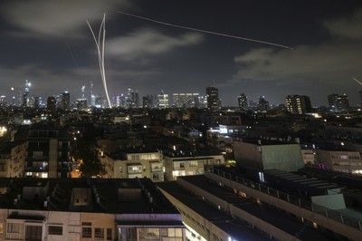 New Israeli strikes hit Tehran as Iran warns that US involvement would risk 'all-out war'