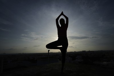 Indians stretch, breathe and balance to mark International Day of Yoga