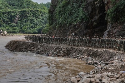 Heavy rain causes flooding, evacuations and at least 38 deaths around Beijing region
