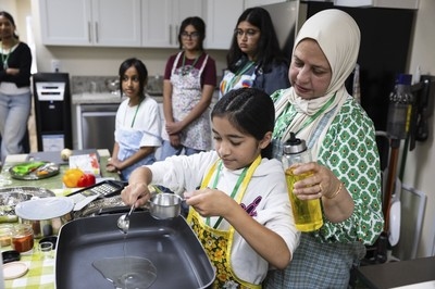 At this summer camp run by grandmas, kids learn cooking skills and life advice