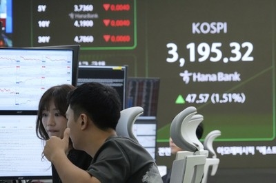 Asian shares advance, tracking rally on Wall Street