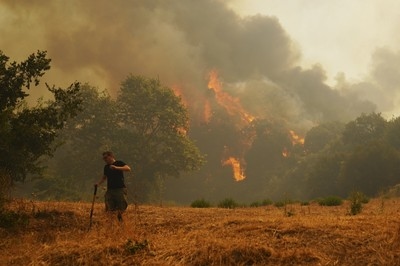 3 dead and thousands displaced as wildfires rage across southern Europe