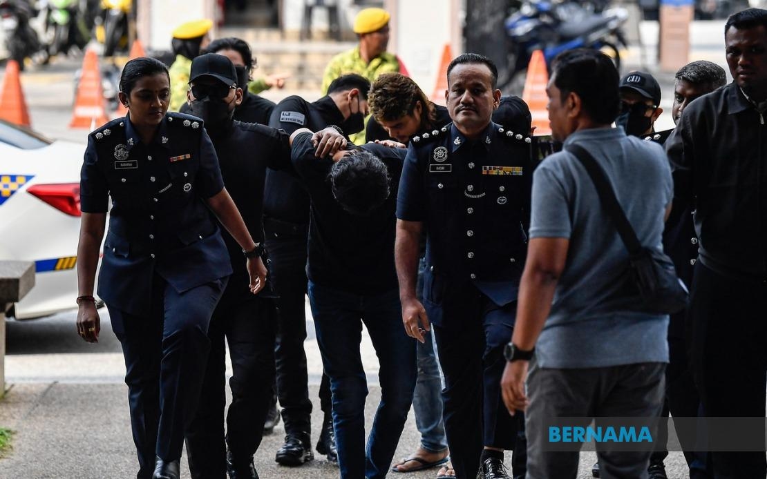 Two Friends Accused Of Robbing Chinese National Of RM2.1 Mln