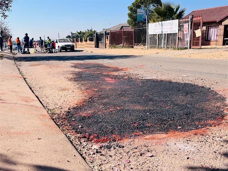 Local churchgoers ‘bless' broken road