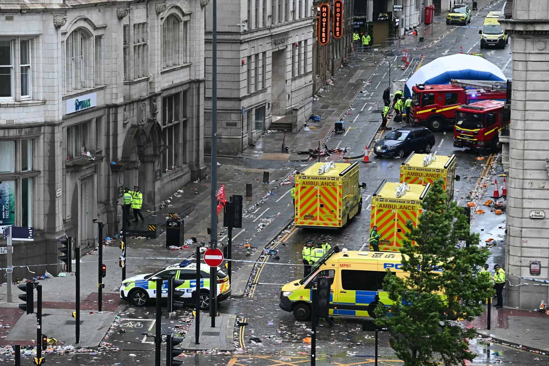 Football unites after car ploughs into Liverpool victory parade