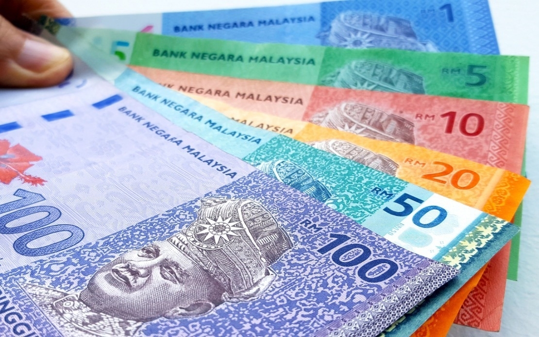 Ringgit slips against US dollar as Fed seen delaying rate cuts