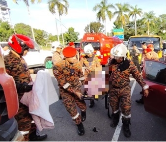 Woman trapped in Kota Kinabalu collision