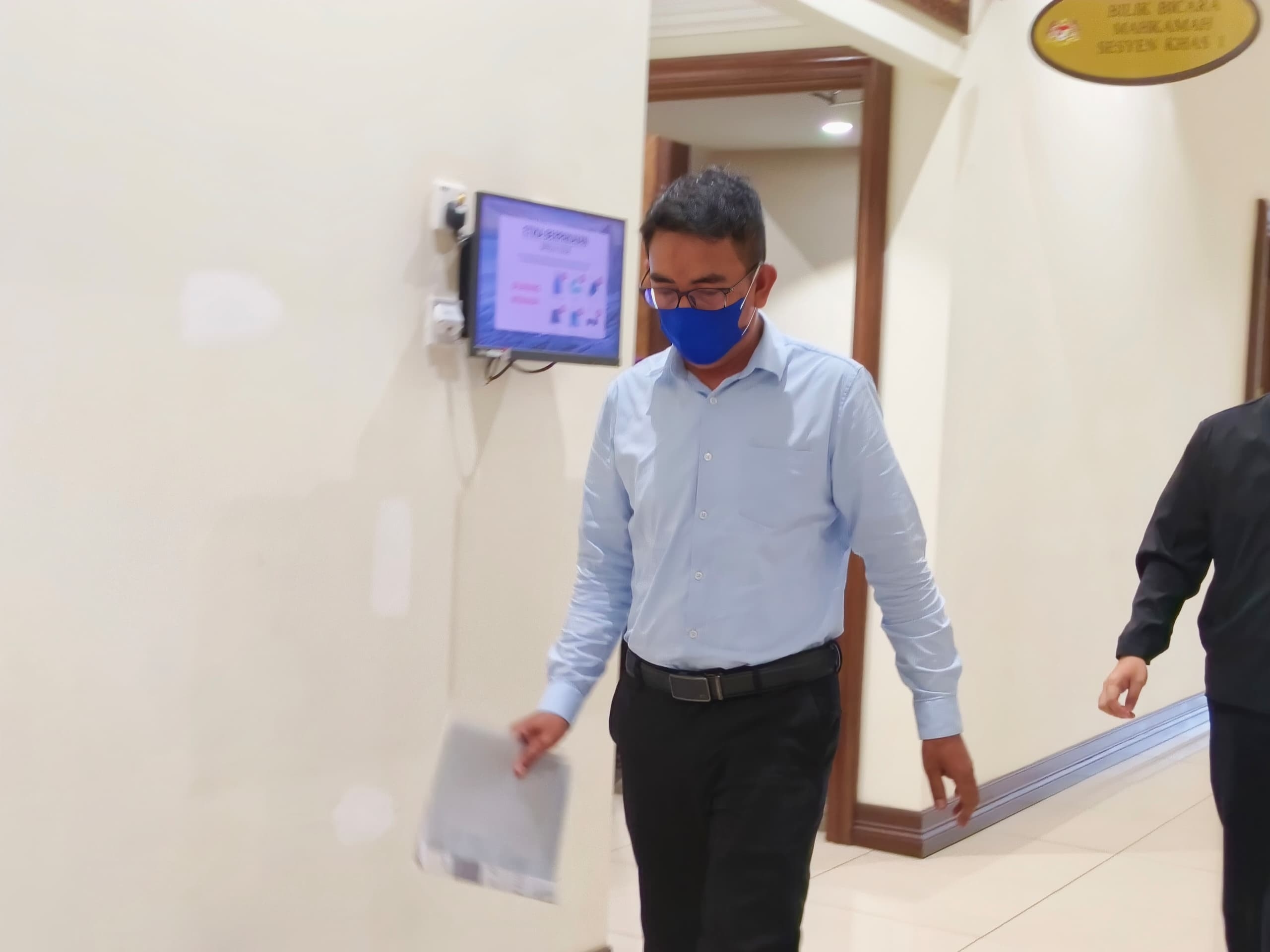 Charged with using fake document