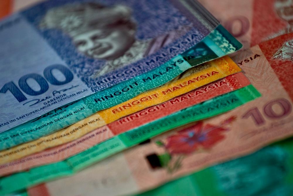 Ringgit opens higher against us dollar amid tariff policy concerns