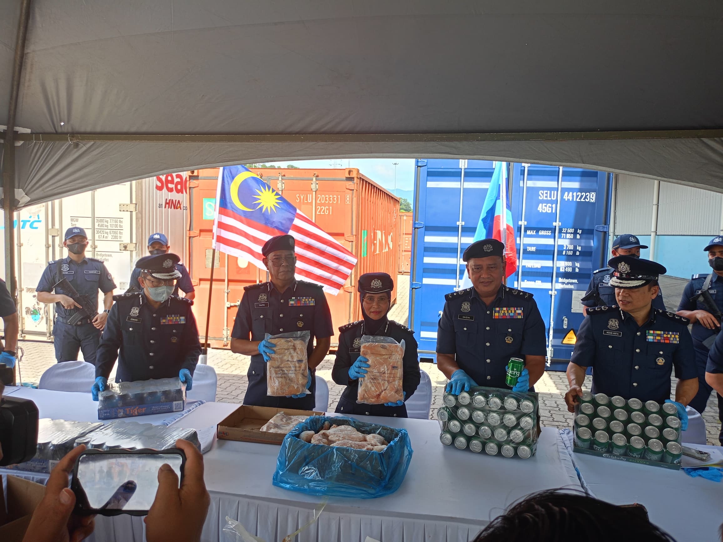 Sabah customs seize RM16.6 mil in liquor, chicken and rice