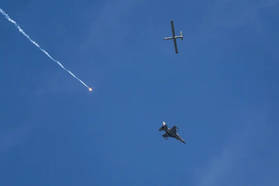 Israel says struck military sites in west Iran