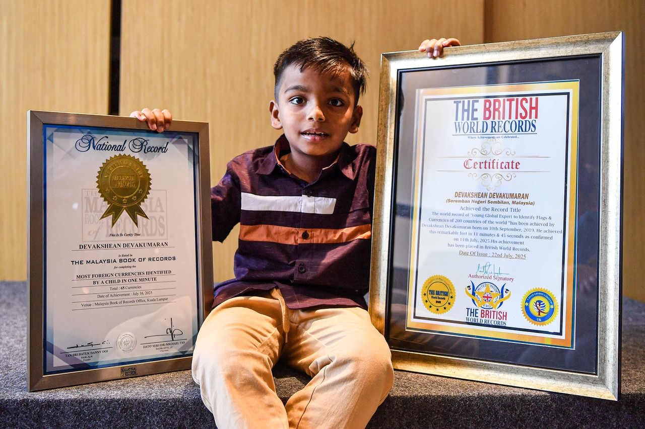 Malaysian boy enters record books with amazing memory for world currencies