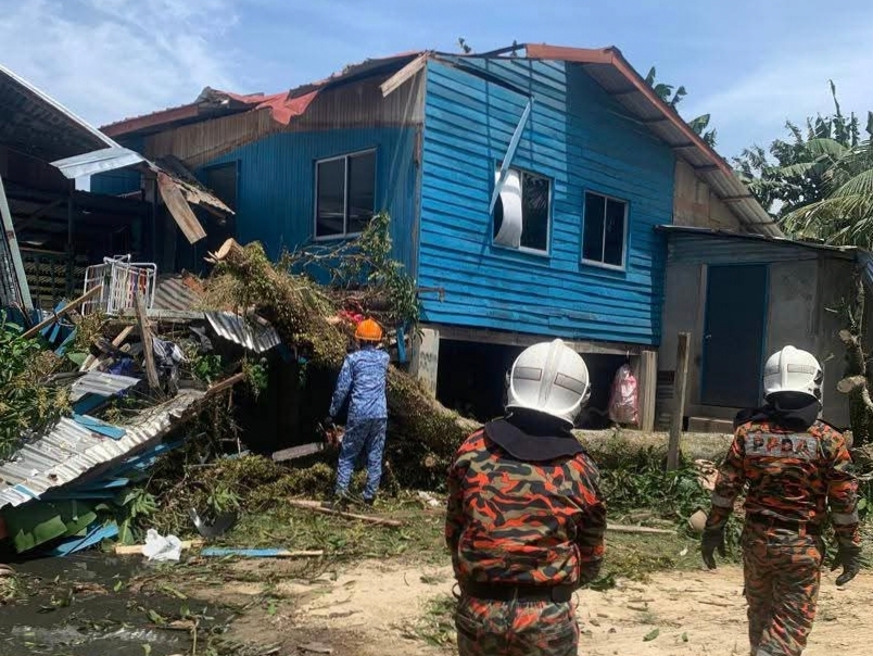 House hit by tree while family attends convocation