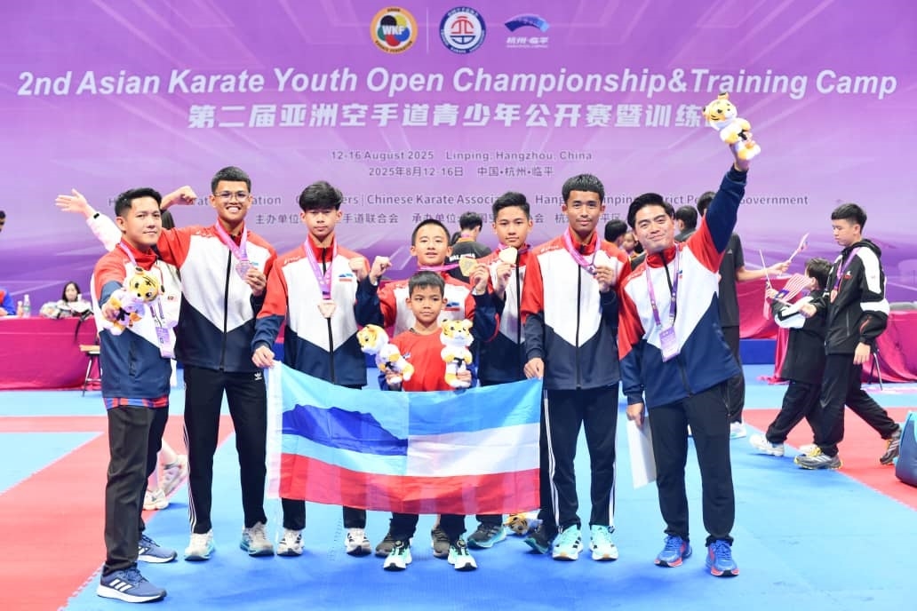 SKA karatekas bag 2 golds, a silver, 2 bronzes