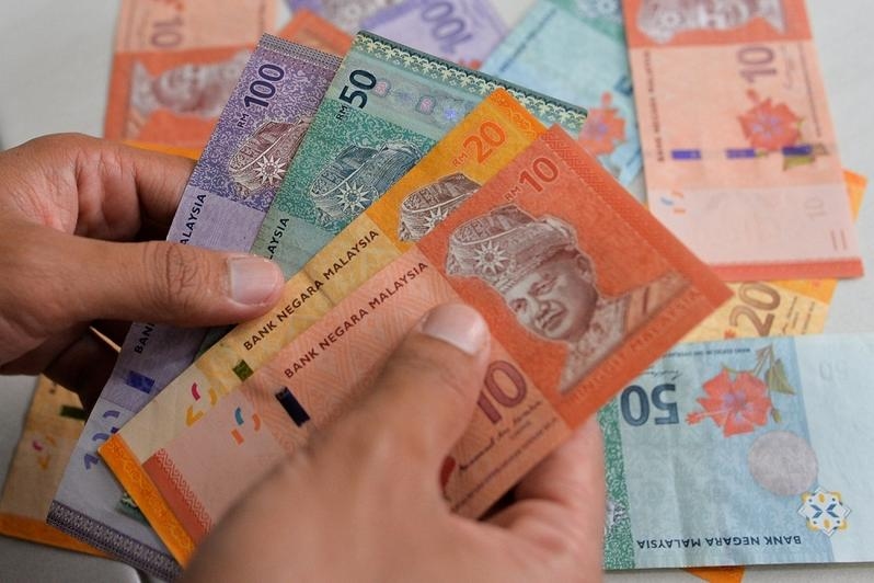 Ringgit gains on weak US data, Fed rate cut expectations
