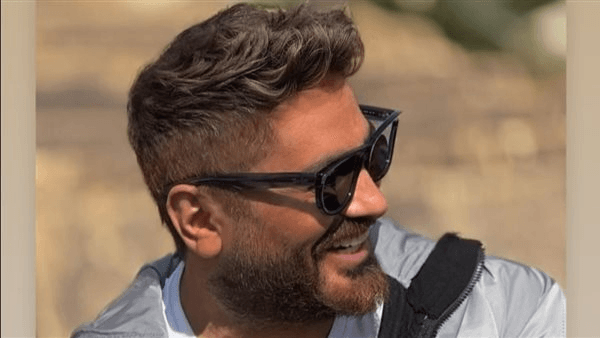 تامر حسني يشارك جمهوره أحدث ظهور ومنى فاروق تعلق