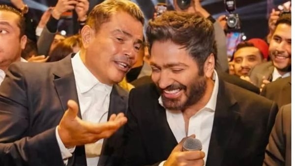 تامر حسني لـ عمرو دياب: "ألبومي رقم 1 مش 4.. وأنت أكبر من كده"