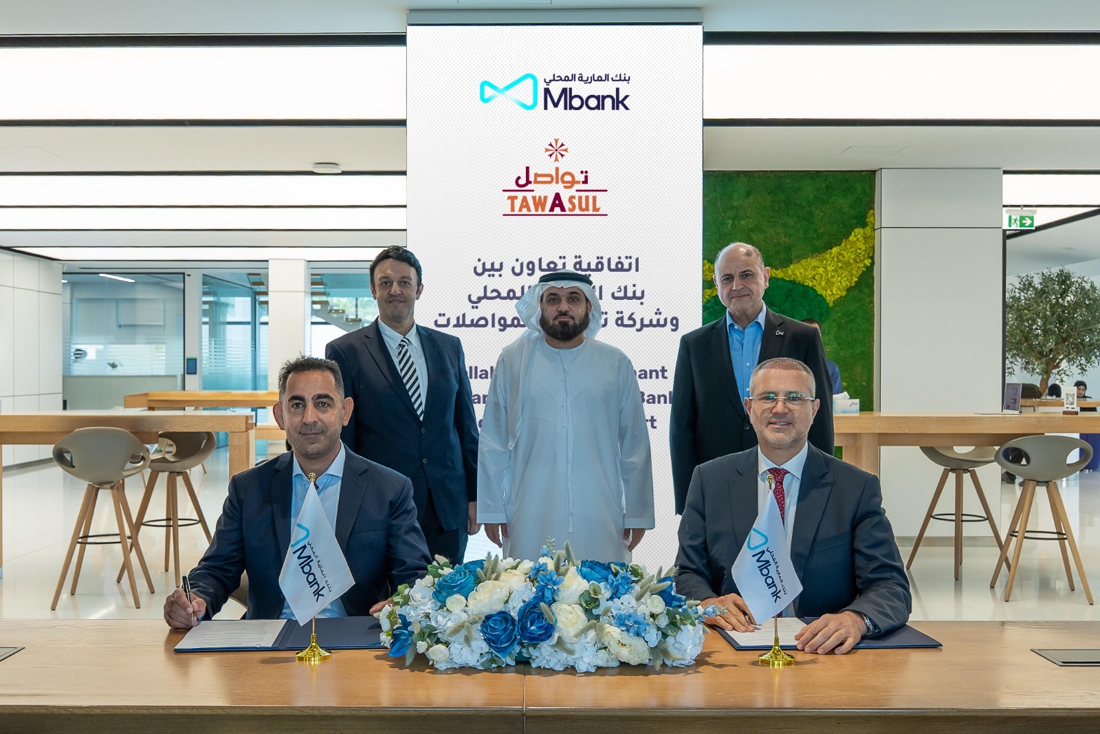 إطلاق أول عملية دفع رقمية باستخدام عملة AE Coin في مركبات الأجرة بأبوظبي