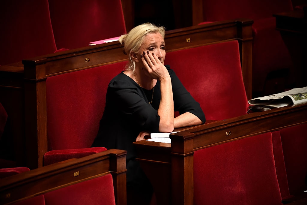 Inside the growing judicial cloud over France's far-right party