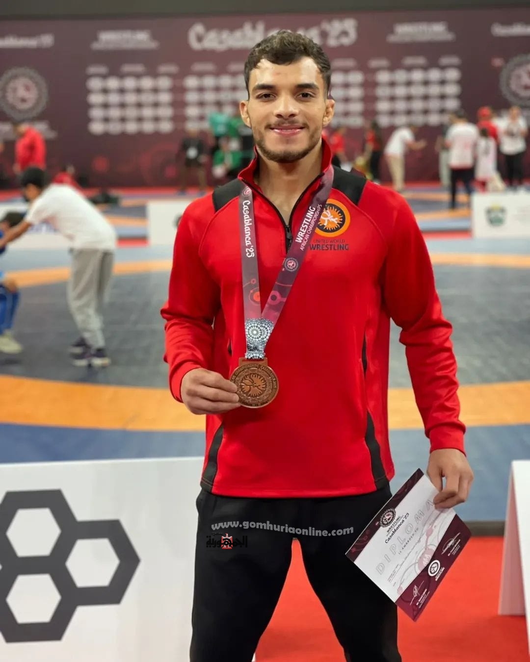 معاويه تهنئ ابن الجامعة بطل المصارعة الحرةالفائز ببرونزية أفريقيا