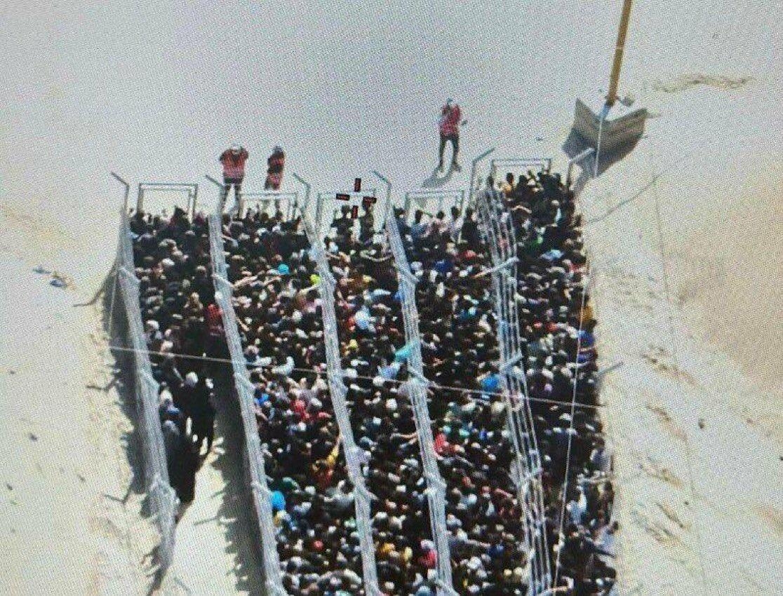 Shots Fired as Palestinians Overrun Aid Site; U.S. Contractors Flee