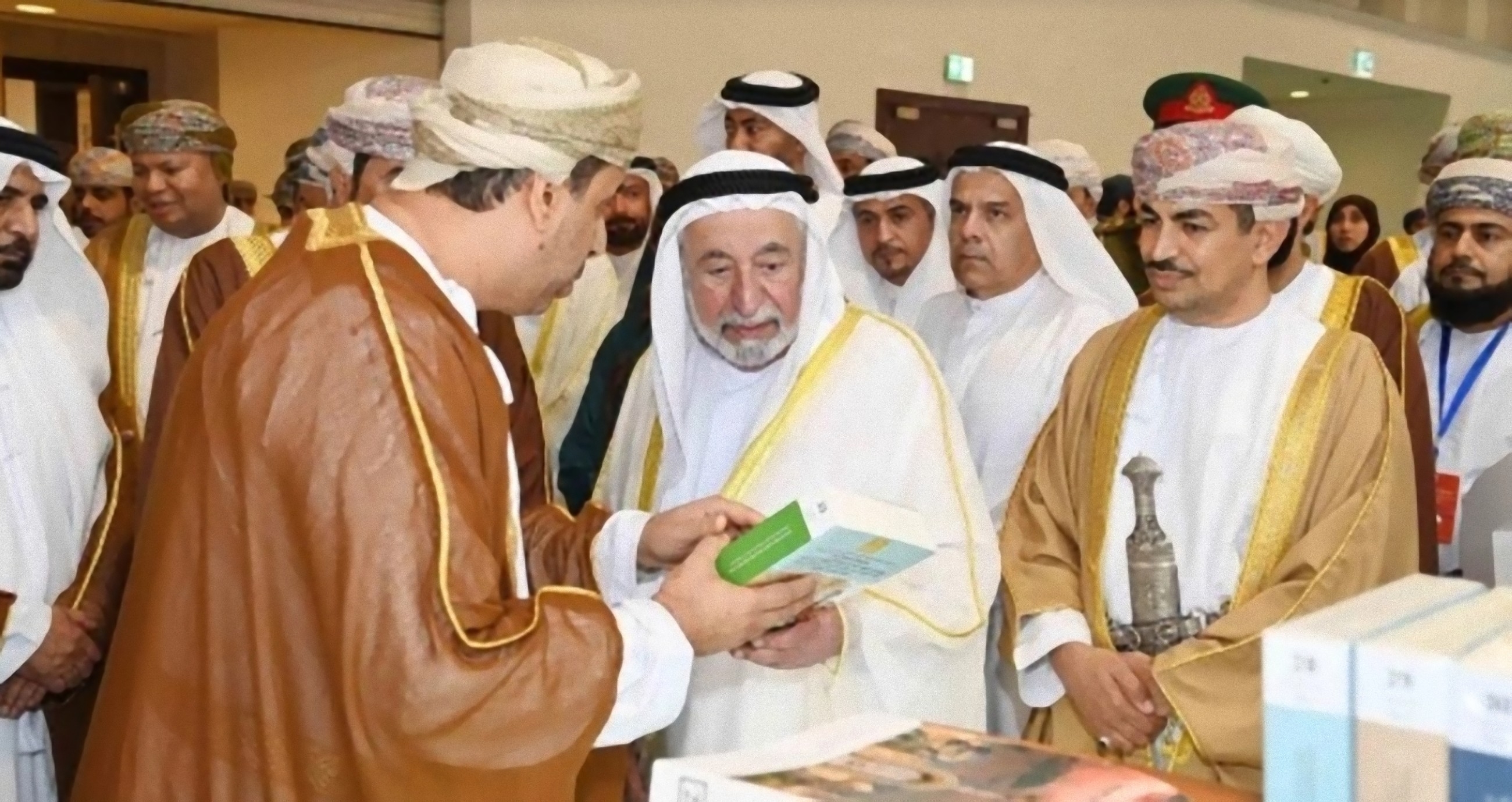 Sheikh Sultan signs copies of 'The Portuguese in the Sea of Oman' at Muscat Book Fair
