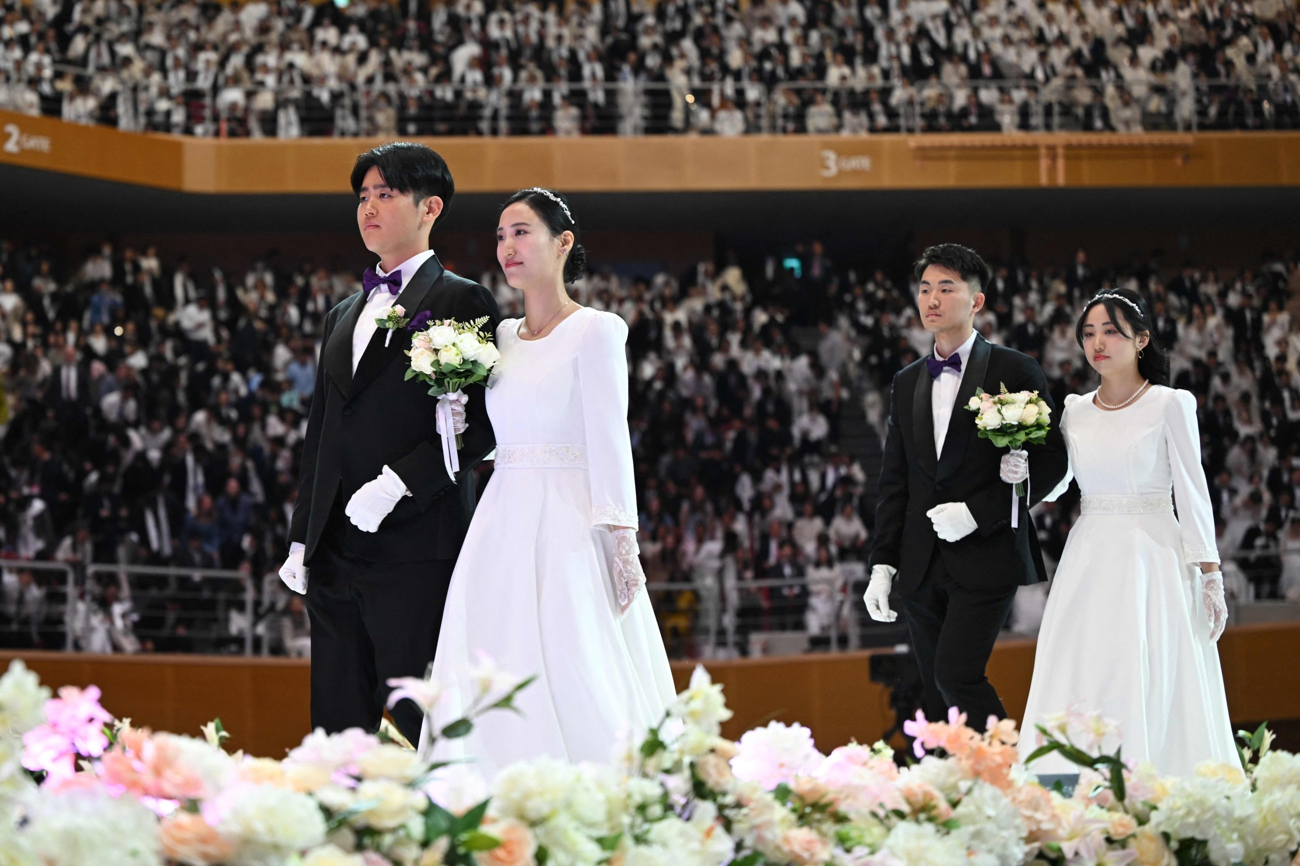 'Happiness, love' at Moonie mass wedding after Japanese court blow