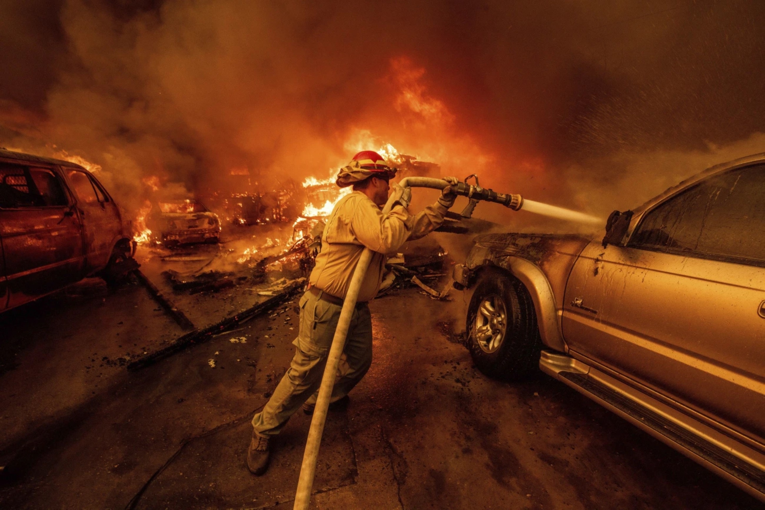 As wildfires intensify, utilities want liability protections