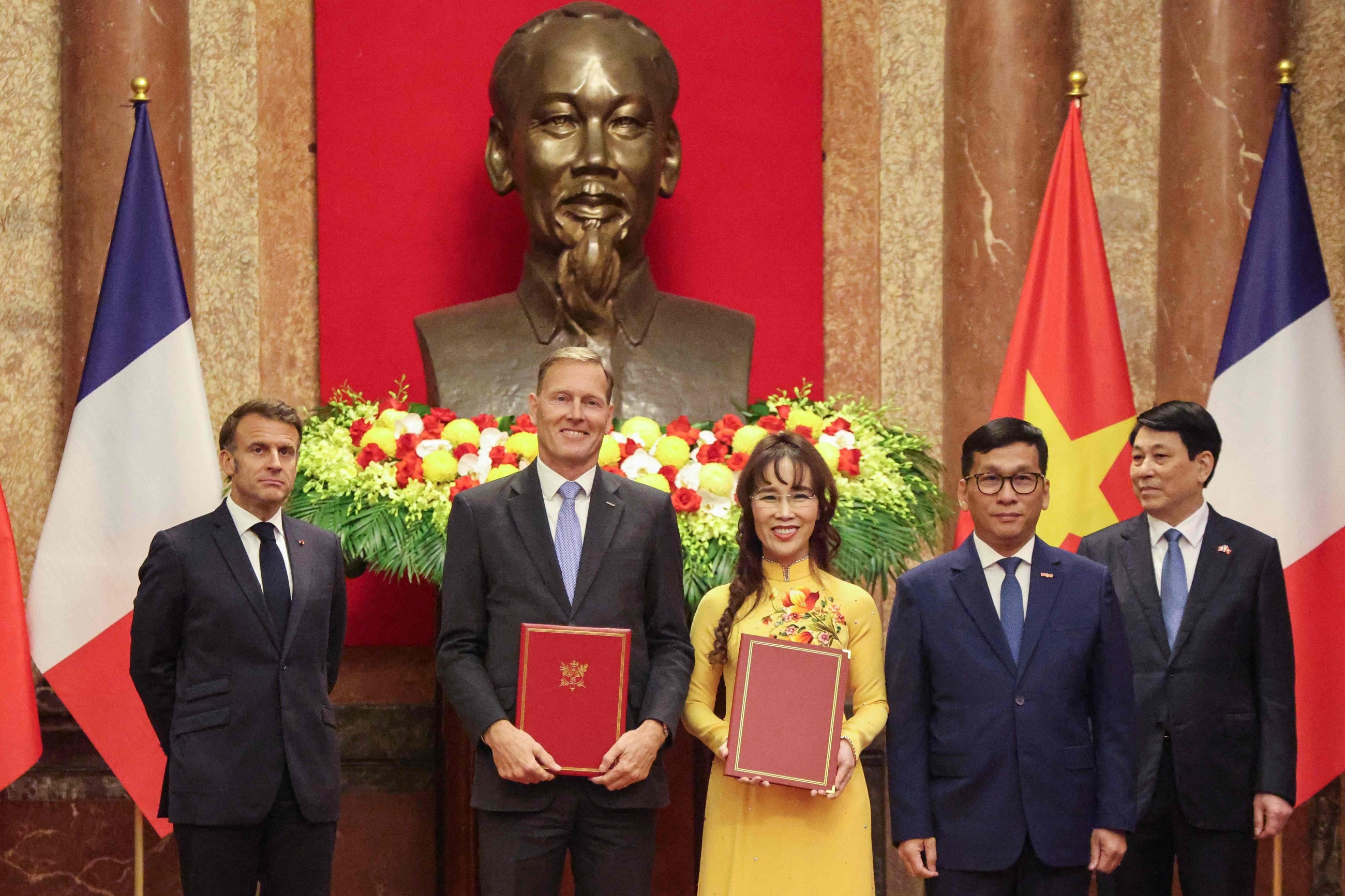 France, Vietnam sign Airbus deals as Macron visits Hanoi