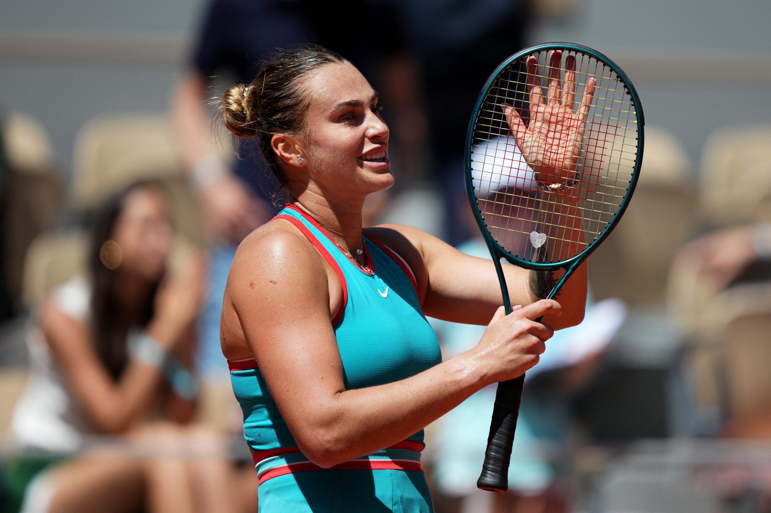 Sabalenka and Swiatek through, Musetti battles into French Open last 16