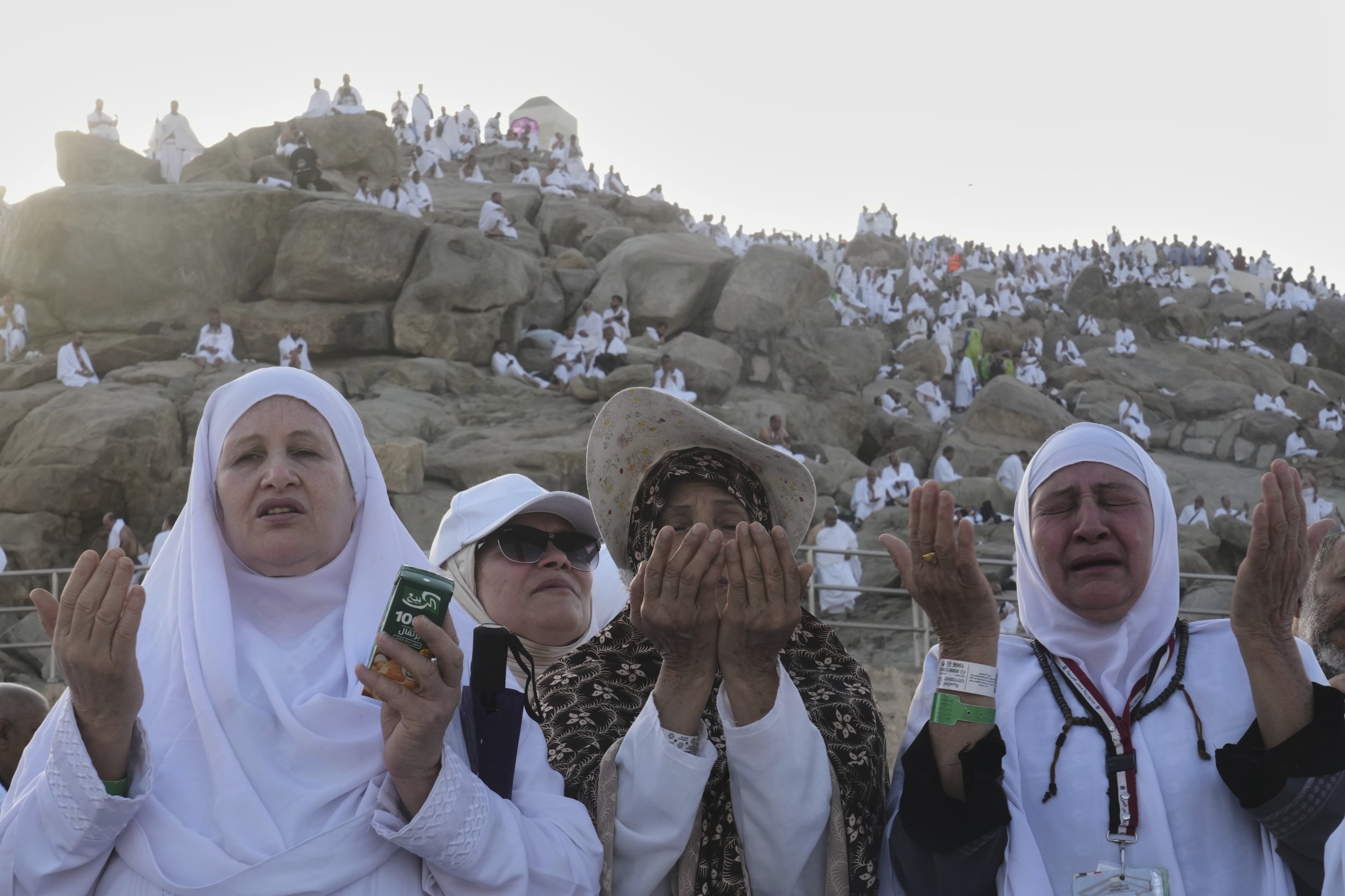 Pilgrims seek forgiveness and shade on Mount Arafat during key Hajj ritual