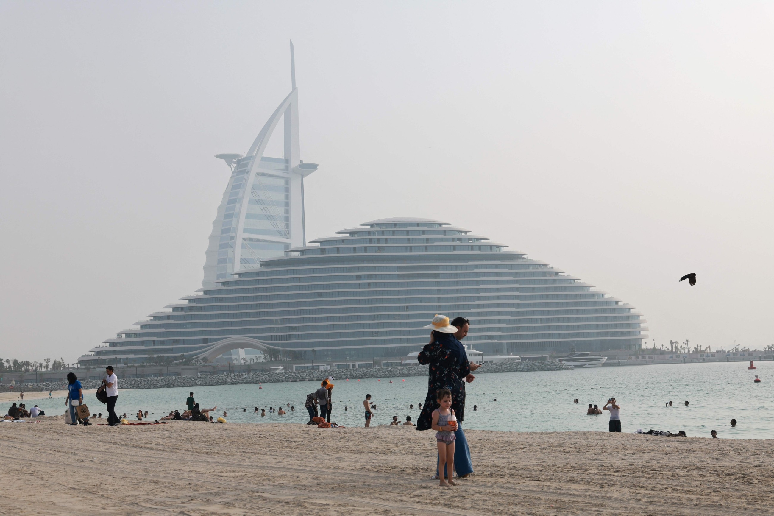 High temperatures, humidity, rain clouds and dust: What to expect from UAE's August weather
