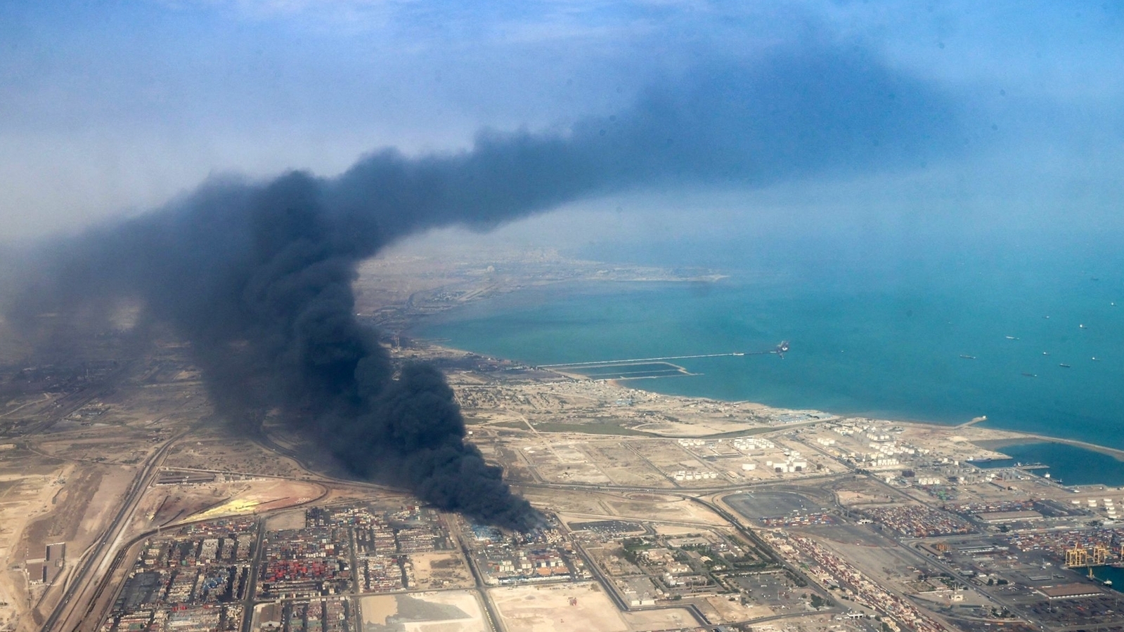 Iran orders probe into port blast that killed 40