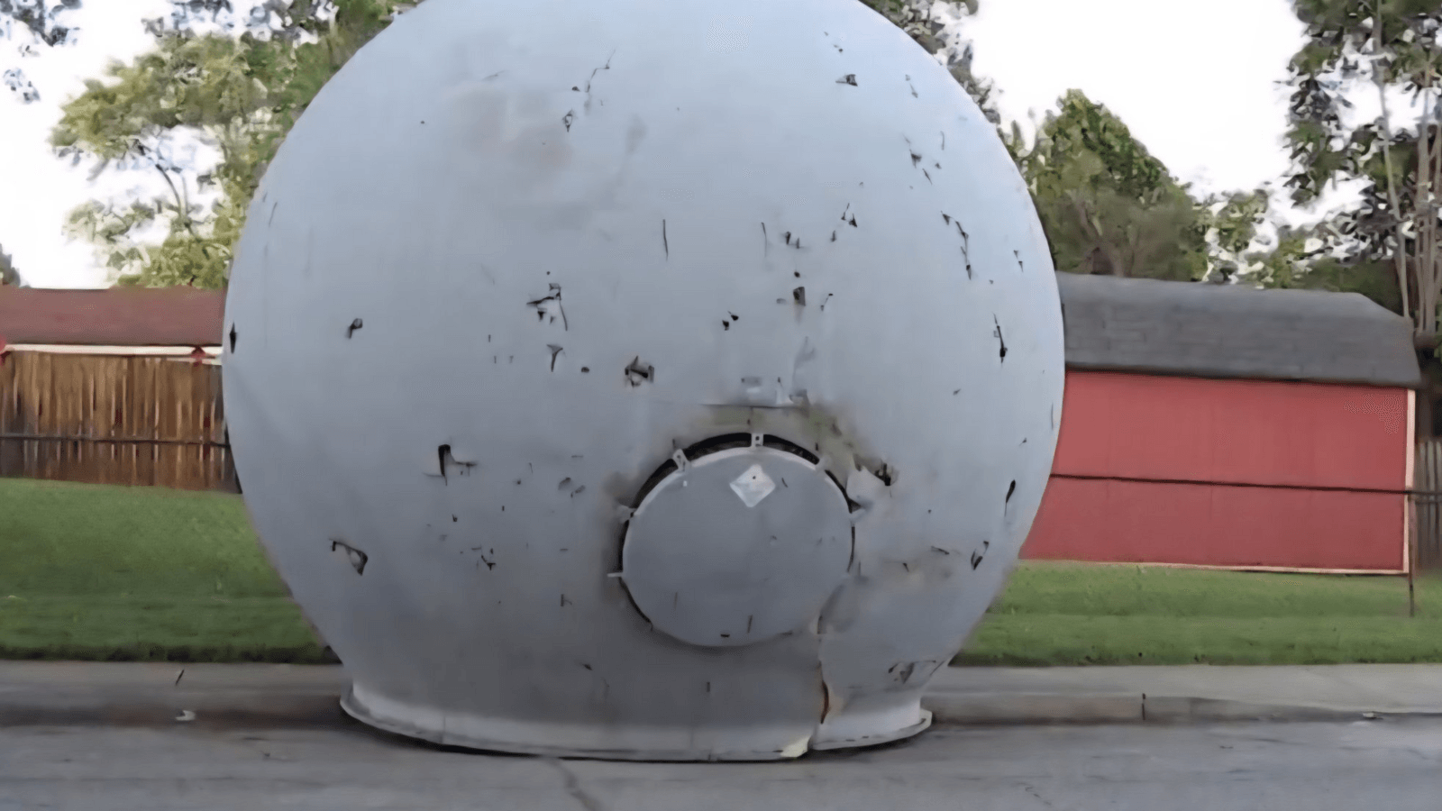 Mysterious white sphere crashes into Indiana street during storm, turns out to be...