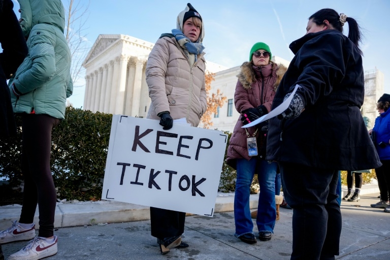 Trump says US in talks with four groups over TikTok sale