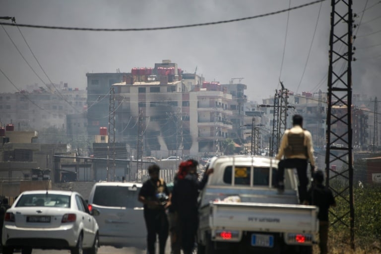 Calm returns to south Syria after violence that killed 1,000