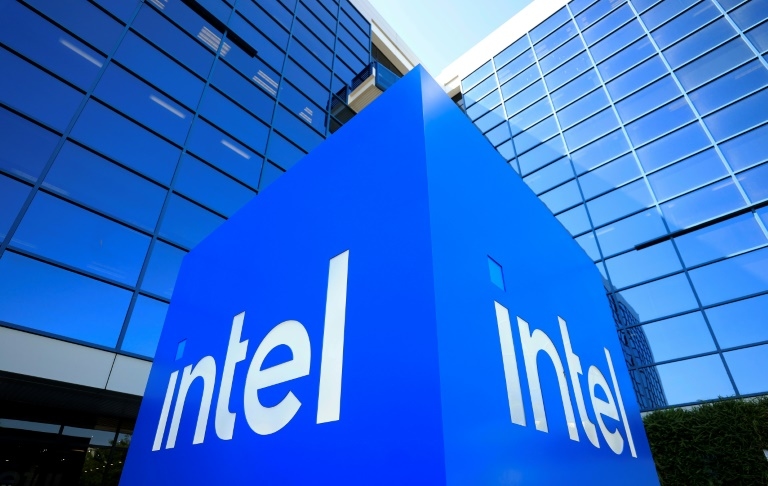 US chip maker Intel says revenue rose as it cut ranks