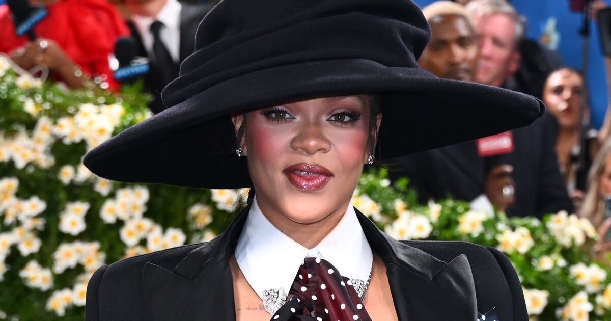 Rihanna reveals baby bump on star-studded Met Gala blue carpet