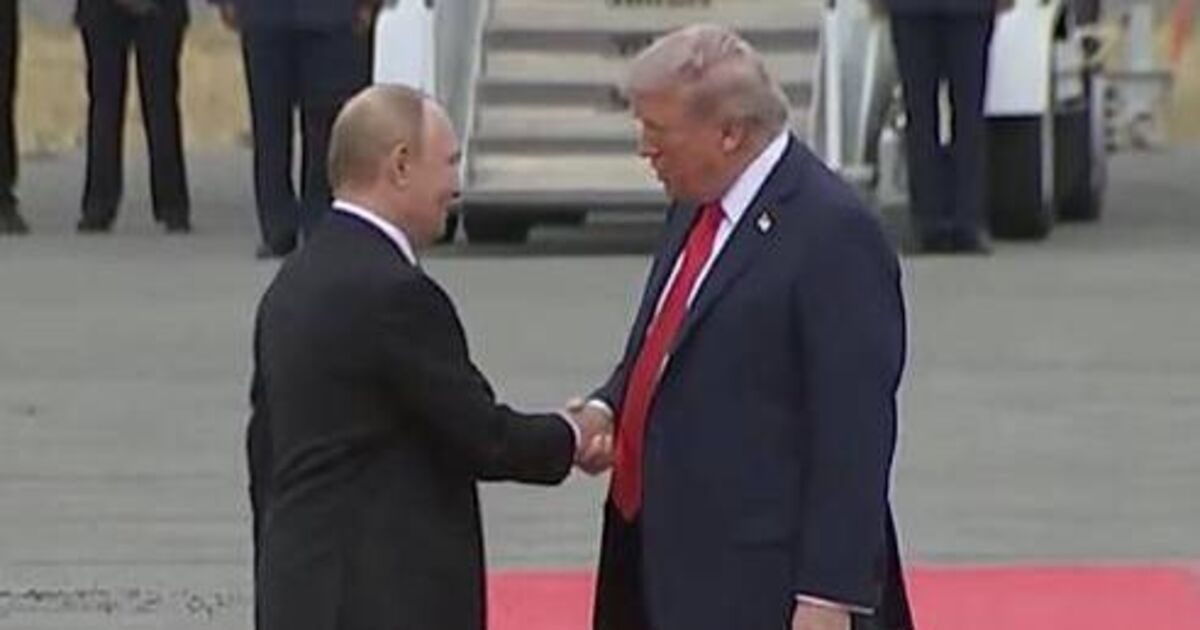 Donald Trump and Vladimir Putin shake hands on arrival for Ukraine war talks