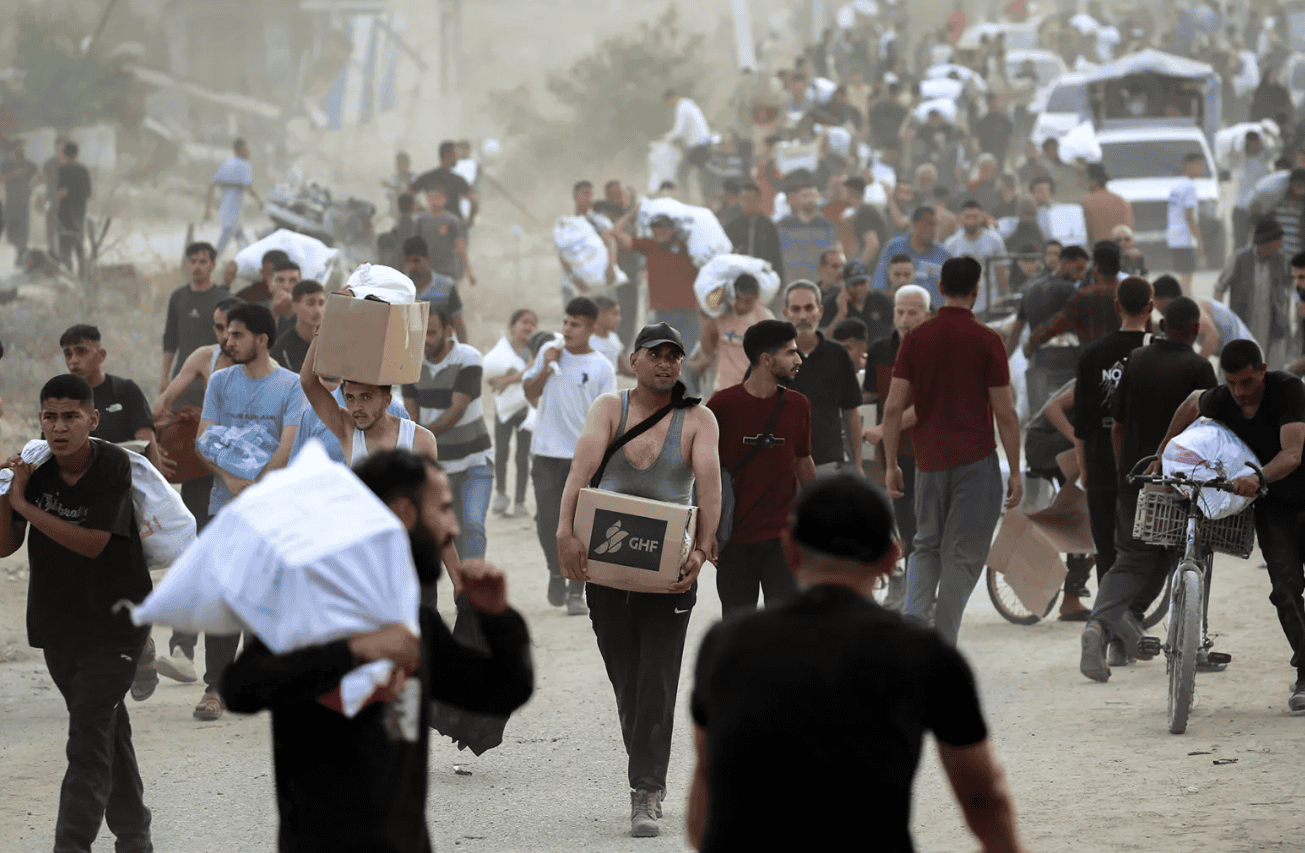 Israel Kills 51 Palestinians Near Aid Site in Gaza