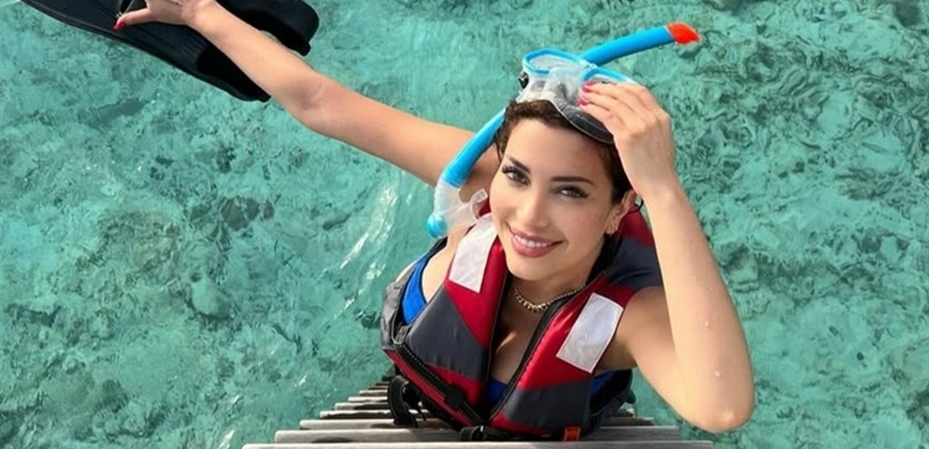 في شهر العسل... نسرين طافش بالمايوه تُمارس الغطس برفقة زوجها الجديد (فيديو)