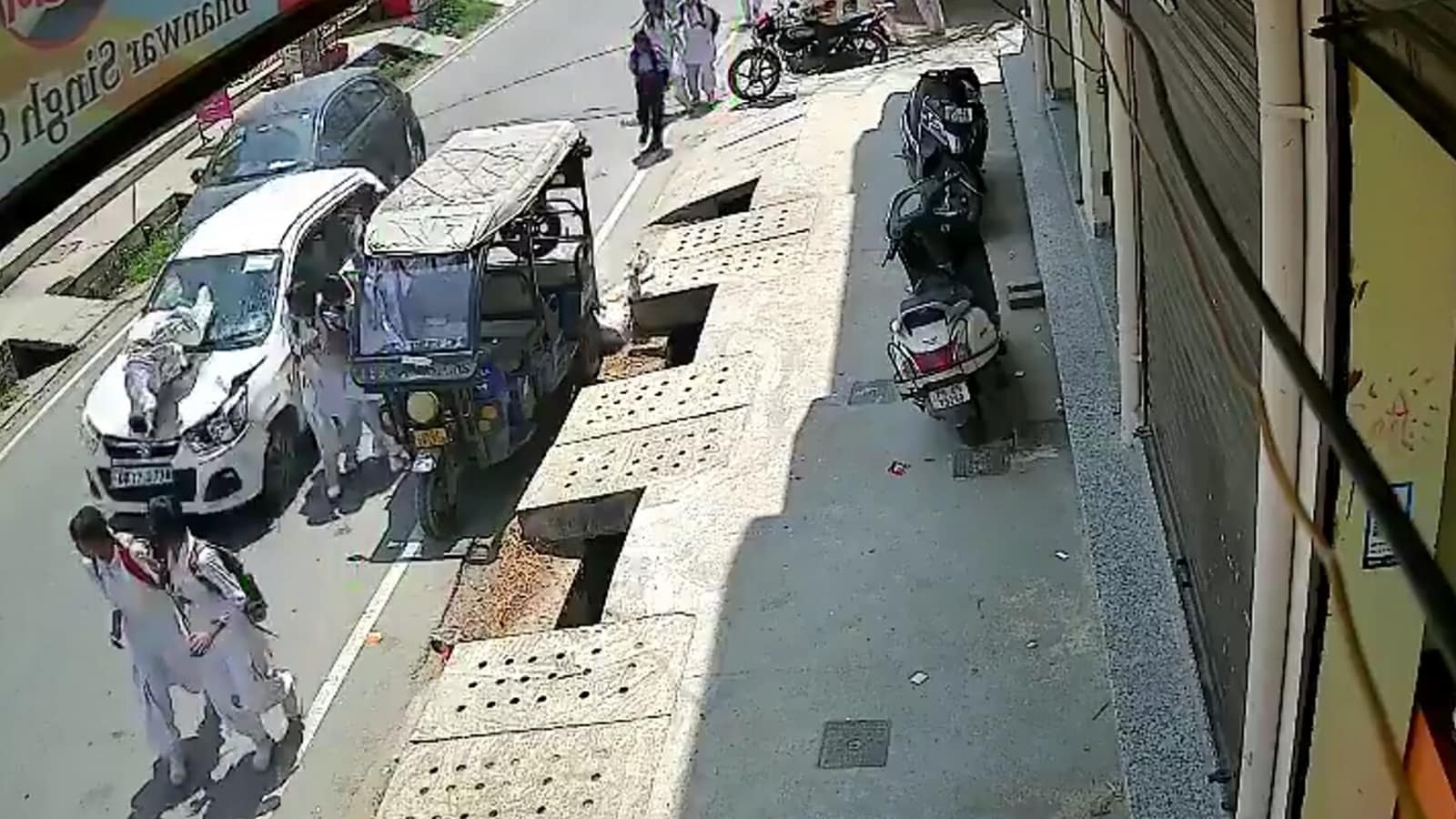Caught on camera: Speeding car tosses schoolchildren into air; eight injured