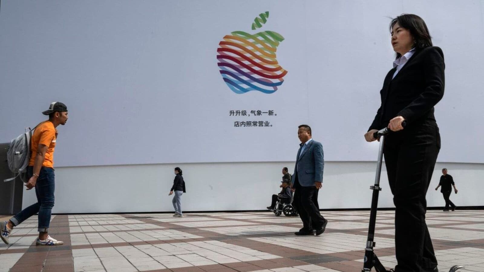 Apple sales surge on iPhone demand ahead of tariff uncertainty