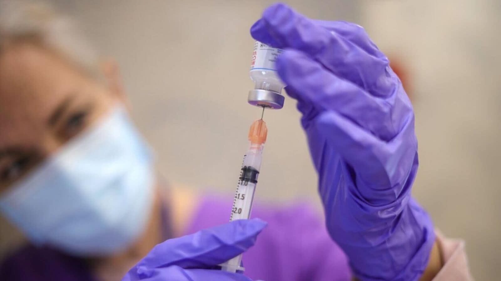 FDA expands warning about rare heart side effect in two leading Covid vaccines