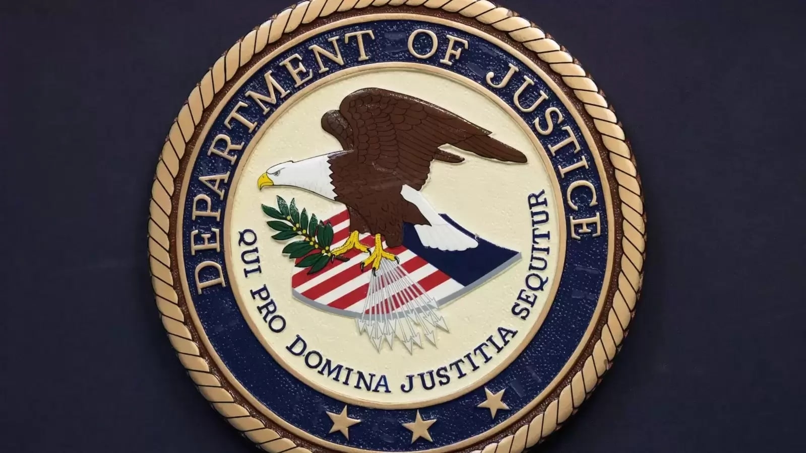 Two Chinese nationals charged in efforts to recruit spies in US military for Beijing