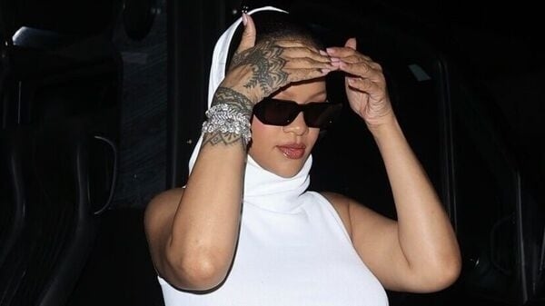 Rihanna's unique maternity fashion: Pregnant mama makes style statement at Giorgio Baldi after Smurfs premiere